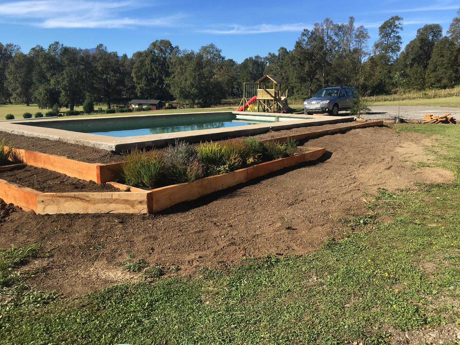 Proceso de re-semillado de césped